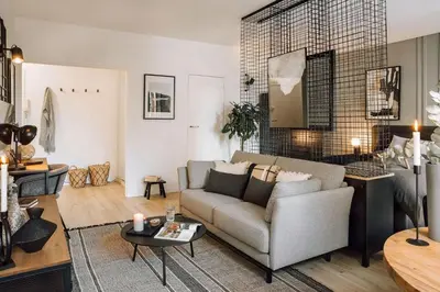 Coin salon dans l'établissement Nuria - Studio et balcon à Auteuil
