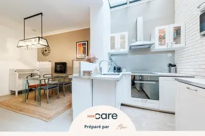 Cuisine ou kitchenette dans l'établissement Le Reflet Saint-Martin - gare du Nord et de l'Est
