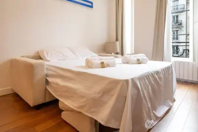 Un ou plusieurs lits dans un hébergement de l'établissement Appartement Richer - Welkeys