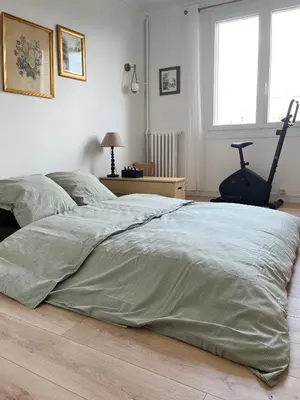 Un ou plusieurs lits dans un hébergement de l'établissement Nouveau Appartement 2p parisien