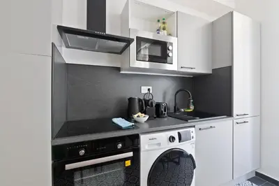 Cuisine ou kitchenette dans l'établissement 2 Bedroom Apartment Île Saint-Louis With Free Netflix