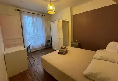 Un ou plusieurs lits dans un hébergement de l'établissement Love Montmartre
