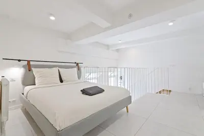 Un ou plusieurs lits dans un hébergement de l'établissement Studio Apartment Near Eiffel Tower with NetFlix