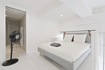 Un ou plusieurs lits dans un hébergement de l'établissement Studio Apartment Near Eiffel Tower with NetFlix