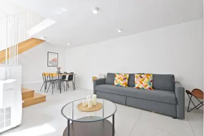 Coin salon dans l'établissement Studio Apartment Near Eiffel Tower with NetFlix