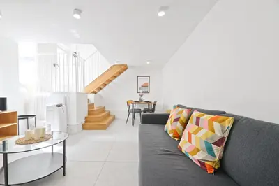 Coin salon dans l'établissement Studio Apartment Near Eiffel Tower with NetFlix