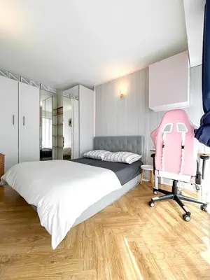Un ou plusieurs lits dans un hébergement de l'établissement Appartement Avec Piscine Métro Convention