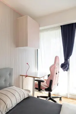 Un ou plusieurs lits dans un hébergement de l'établissement Appartement Avec Piscine Métro Convention