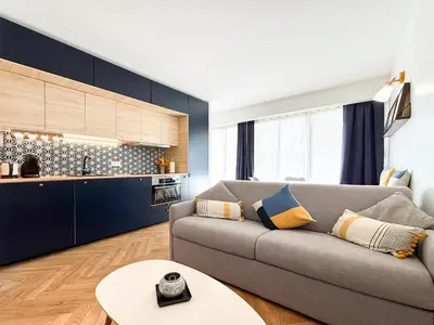Coin salon dans l'établissement Appartement Avec Piscine Métro Convention