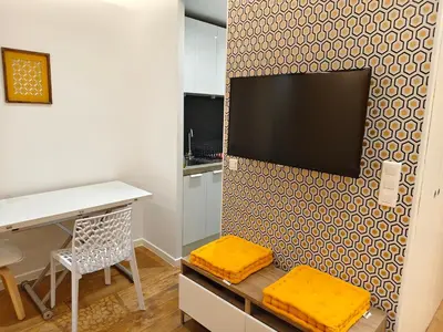 Télévision ou salle de divertissement dans l'établissement Jolie Montorgeuil
