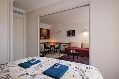 Un ou plusieurs lits dans un hébergement de l'établissement Park & Relax - Paris Expo Versailles