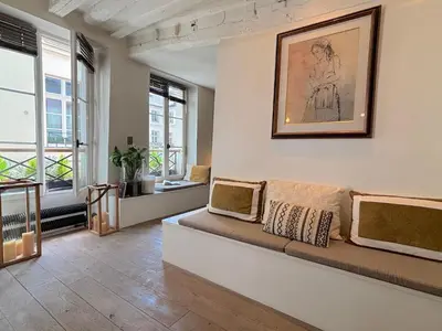 Coin salon dans l'établissement L'appartement Charlot C