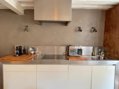 Cuisine ou kitchenette dans l'établissement L'appartement Charlot C