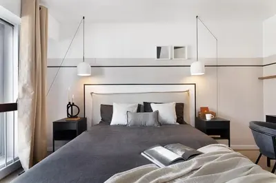 Un ou plusieurs lits dans un hébergement de l'établissement Nation - 2 chambres et balcon à Charonne