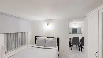 Un ou plusieurs lits dans un hébergement de l'établissement Bienvenue dans le 10ème arrondissement !