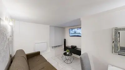 Télévision ou salle de divertissement dans l'établissement Bienvenue dans le 10ème arrondissement !
