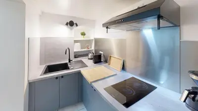 Cuisine ou kitchenette dans l'établissement Bienvenue dans le 10ème arrondissement !