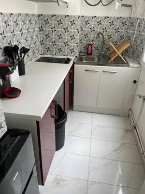 Cuisine ou kitchenette dans l'établissement Petit cocon au nord de Paris