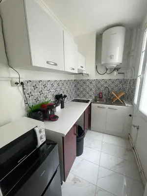 Cuisine ou kitchenette dans l'établissement Petit cocon au nord de Paris