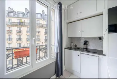 Cuisine ou kitchenette dans l'établissement Studio cosy