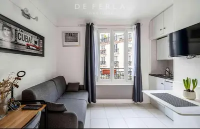 Télévision ou salle de divertissement dans l'établissement Studio cosy