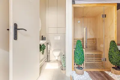 Salle de bains dans l'établissement Duplex Luxe - Sauna & Jacuzzi Privatif