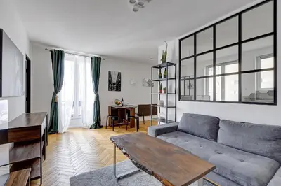 Coin salon dans l'établissement Suite Thouars - Havre de paix au cœur de Paris