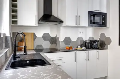 Cuisine ou kitchenette dans l'établissement Suite Thouars - Havre de paix au cœur de Paris