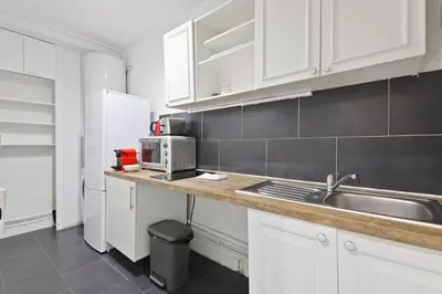 Cuisine ou kitchenette dans l'établissement 1 Bedroom Apartment Monge II up to 4 Guests With NetFlix