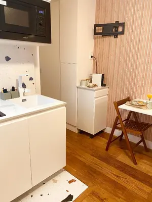 Cuisine ou kitchenette dans l'établissement Modern & Chic Studio Paris 17- Perfect Location