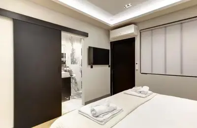 Un ou plusieurs lits dans un hébergement de l'établissement Elegant flat - 2BR-6P