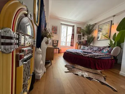 Un ou plusieurs lits dans un hébergement de l'établissement Chambre rétro