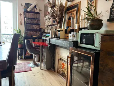 Cuisine ou kitchenette dans l'établissement Chambre rétro