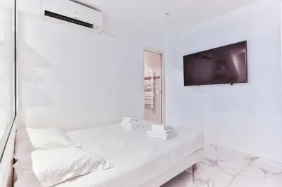 Un ou plusieurs lits dans un hébergement de l'établissement Cozy apartment - 1BR 4P - Eiffel Tower