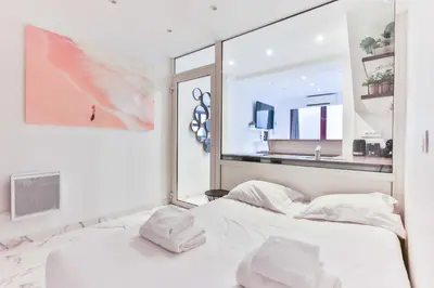 Un ou plusieurs lits dans un hébergement de l'établissement Cozy apartment - 1BR 4P - Eiffel Tower