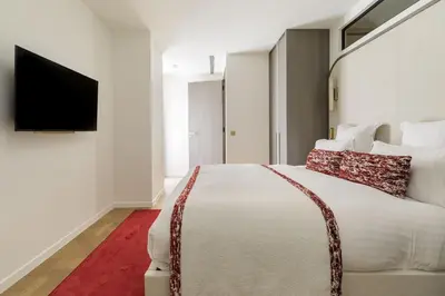 Un ou plusieurs lits dans un hébergement de l'établissement Oniri - Serviced Apartment in Saint Germain des Prés - Rue de Verneuil