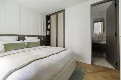 Un ou plusieurs lits dans un hébergement de l'établissement Oniri - Serviced Apartment in Saint Germain des Prés - Rue de Verneuil