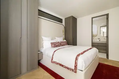 Un ou plusieurs lits dans un hébergement de l'établissement Oniri - Serviced Apartment in Saint Germain des Prés - Rue de Verneuil