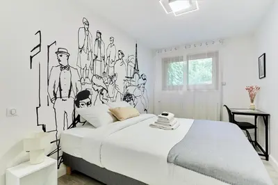 Un ou plusieurs lits dans un hébergement de l'établissement Élégant 1 chambre climatisé Tour Eiffel à pied