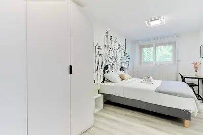 Un ou plusieurs lits dans un hébergement de l'établissement Élégant 1 chambre climatisé Tour Eiffel à pied