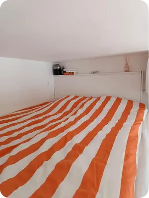 Un ou plusieurs lits dans un hébergement de l'établissement Appartement, Paris Montmartre