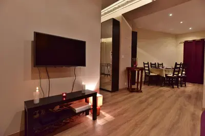 Télévision ou salle de divertissement dans l'établissement Loft Deluxe du Moulin Vert