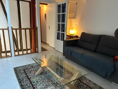 Coin salon dans l'établissement Appartement Duplex, Place de la Bastille, 11ème arrondissement