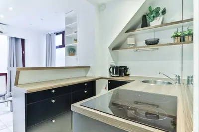 Cuisine ou kitchenette dans l'établissement Charming 1BR 4P - Eiffel Tower Trocadero