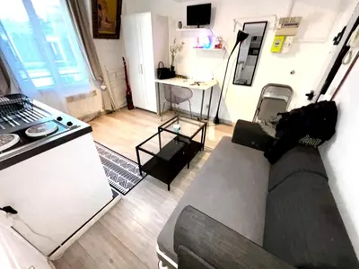 Télévision ou salle de divertissement dans l'établissement Stay in Montmartre