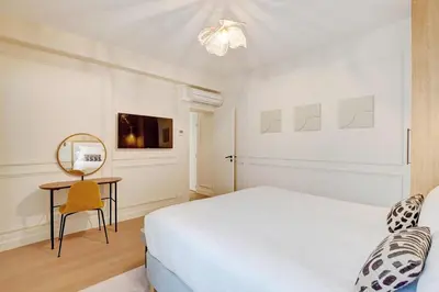 Un ou plusieurs lits dans un hébergement de l'établissement Pick A Flat's Apartment in Montorgueil - Rue Saint Sauveur