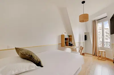 Un ou plusieurs lits dans un hébergement de l'établissement Maison Urbaine