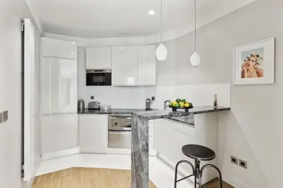 Cuisine ou kitchenette dans l'établissement BnBNova - Le Marais & Place des Vosges