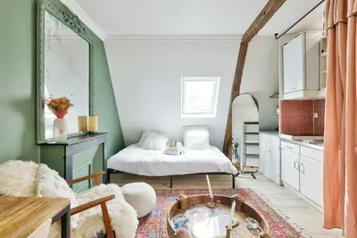 Un ou plusieurs lits dans un hébergement de l'établissement Parisian studio near Place de la République