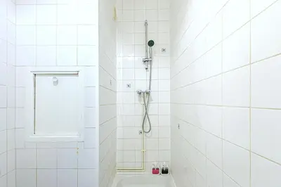 Salle de bains dans l'établissement Le Petit Auber & son balcon, à 2 pas de Paris